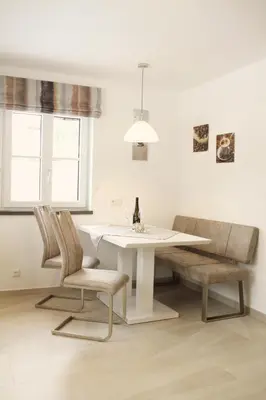 Ein Sitzbereich in der Unterkunft Apartments Fuchs