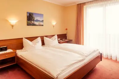 Ein Bett oder Betten in einem Zimmer der Unterkunft Pension Anna