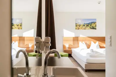 Ein Bett oder Betten in einem Zimmer der Unterkunft Tauernresidence Radstadt by ALPS RESORTS