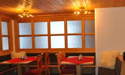 Ein Sitzbereich in der Unterkunft Hotel Grünwaldkopf