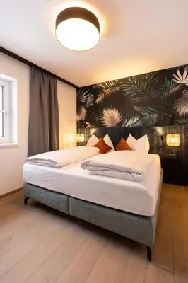 Ein Bett oder Betten in einem Zimmer der Unterkunft CARPE SOLEM Jules