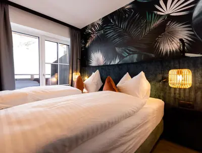 Ein Bett oder Betten in einem Zimmer der Unterkunft CARPE SOLEM Jules