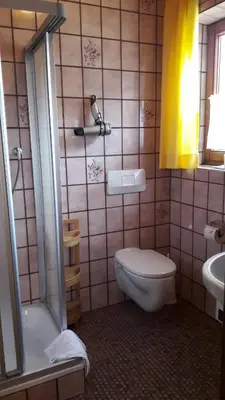 Ein Badezimmer in der Unterkunft Pension Mozart