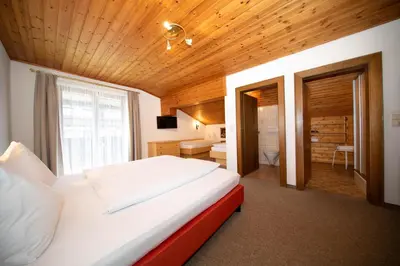 Ein Bett oder Betten in einem Zimmer der Unterkunft Pension Mozart