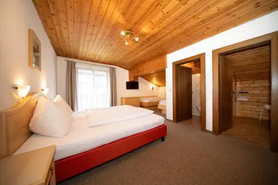 Ein Bett oder Betten in einem Zimmer der Unterkunft Pension Mozart