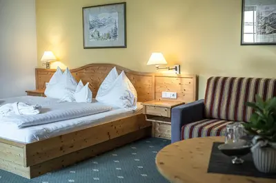 Ein Bett oder Betten in einem Zimmer der Unterkunft DAS Hintersee