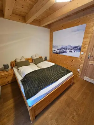 Ein Bett oder Betten in einem Zimmer der Unterkunft Almhütte Lachtal