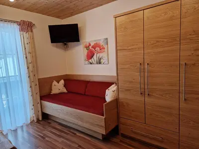 Ein Bett oder Betten in einem Zimmer der Unterkunft Bio-Bauernhof Vordergrubenbach - Familie Oberascher