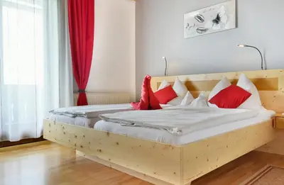 Ein Bett oder Betten in einem Zimmer der Unterkunft Gästehaus Bischof