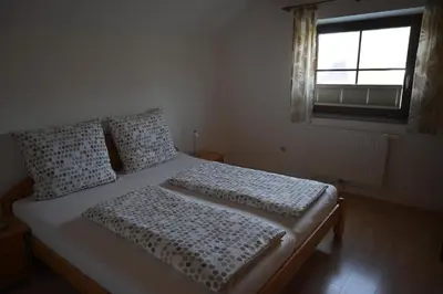Ein Bett oder Betten in einem Zimmer der Unterkunft Ferienhaus Humer