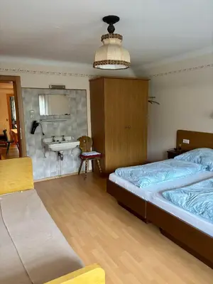 Ein Bett oder Betten in einem Zimmer der Unterkunft Moarhof