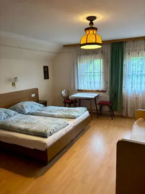 Ein Bett oder Betten in einem Zimmer der Unterkunft Moarhof