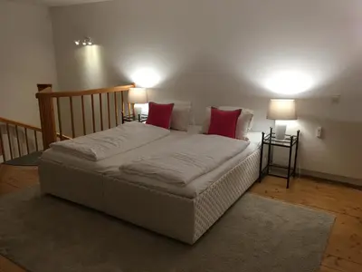 Ein Bett oder Betten in einem Zimmer der Unterkunft Wohnung Schloss Mondsee