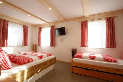 Ein Bett oder Betten in einem Zimmer der Unterkunft Appartement Almzeit mit Infrarotkabine