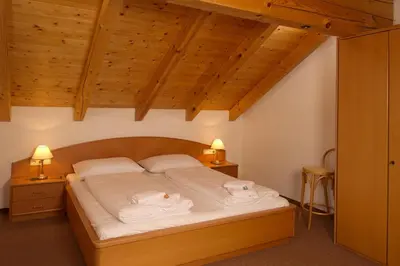 Ein Bett oder Betten in einem Zimmer der Unterkunft Gästehaus Brigitte