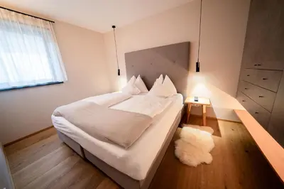 Ein Bett oder Betten in einem Zimmer der Unterkunft Katschberg Lodge