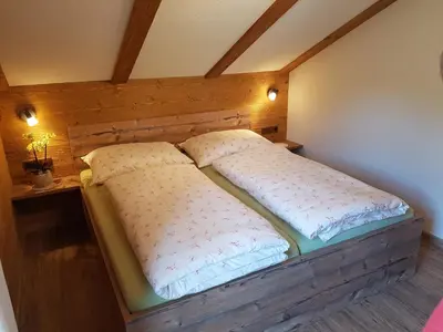 Ein Bett oder Betten in einem Zimmer der Unterkunft Hoamalm