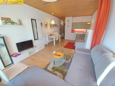 Ein Sitzbereich in der Unterkunft Apartment Grimmingblick