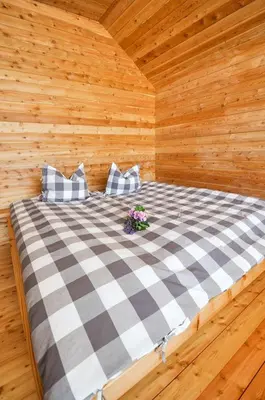 Ein Bett oder Betten in einem Zimmer der Unterkunft Smart Wood House