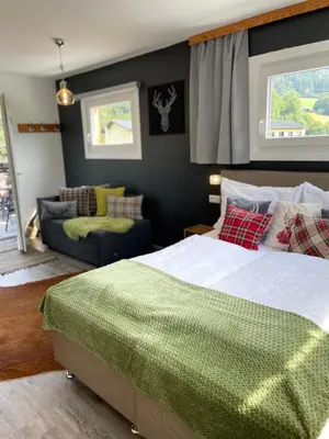 Ein Bett oder Betten in einem Zimmer der Unterkunft Chalet Maya