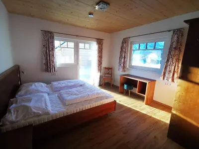 Ein Bett oder Betten in einem Zimmer der Unterkunft Stoffis Hütten