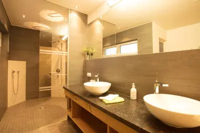 Ein Badezimmer in der Unterkunft Chalet Lärchenzipf