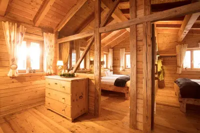 Ein Bett oder Betten in einem Zimmer der Unterkunft Chalet Lärchenzipf