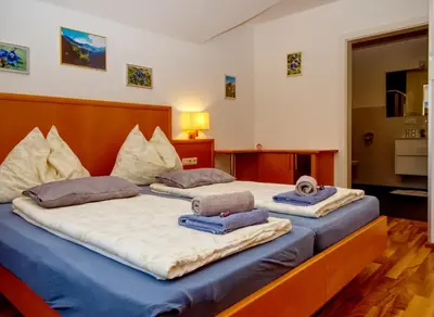 Ein Bett oder Betten in einem Zimmer der Unterkunft Gasthof zum Postwirt