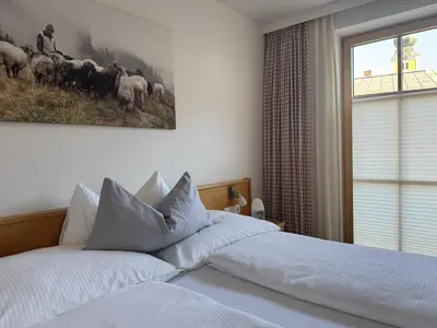 Ein Bett oder Betten in einem Zimmer der Unterkunft Appartement Romana - Altstadt