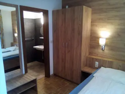 Ein Bett oder Betten in einem Zimmer der Unterkunft Torrenerhof
