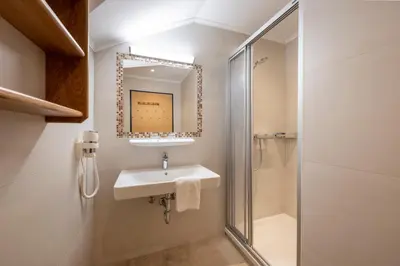 Ein Badezimmer in der Unterkunft Aparthotel am Reitecksee