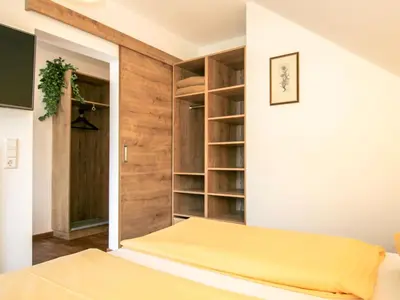 Ein Bett oder Betten in einem Zimmer der Unterkunft Apartment Gipfelkreuz by Interhome
