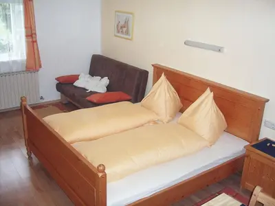 Ein Bett oder Betten in einem Zimmer der Unterkunft Pilznerhof