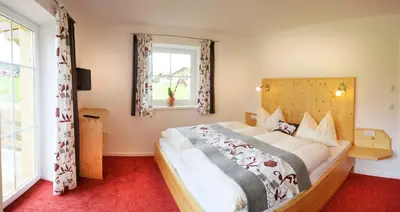 Ein Bett oder Betten in einem Zimmer der Unterkunft Appartement Sonnengarten