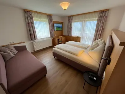 Ein Bett oder Betten in einem Zimmer der Unterkunft Hotel Waldfrieden