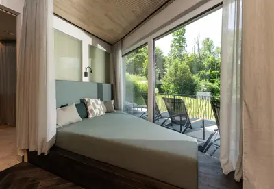 Ein Bett oder Betten in einem Zimmer der Unterkunft Erzherzog Johann Alpin Style Hotel - Adults Only