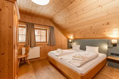 Ein Bett oder Betten in einem Zimmer der Unterkunft Almwelt Austria