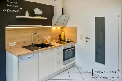 Küche/Küchenzeile in der Unterkunft Verweilzeit Appartementhaus