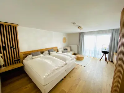Ein Bett oder Betten in einem Zimmer der Unterkunft Verweilzeit Appartementhaus
