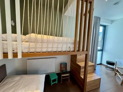 Ein Bett oder Betten in einem Zimmer der Unterkunft Verweilzeit Appartementhaus