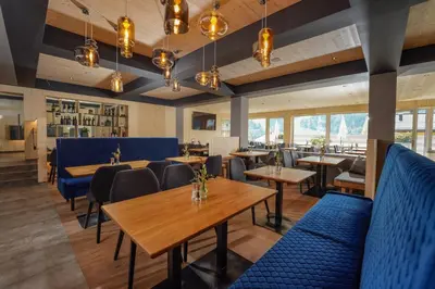 Ein Sitzbereich in der Unterkunft Ferienalm Panorama Apartments