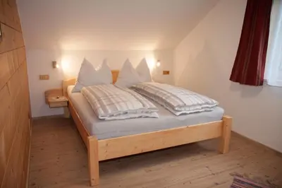 Ein Bett oder Betten in einem Zimmer der Unterkunft Chalet an der Traun