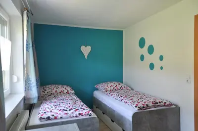 Ein Bett oder Betten in einem Zimmer der Unterkunft Ferienhaus Steyrdurchbruch
