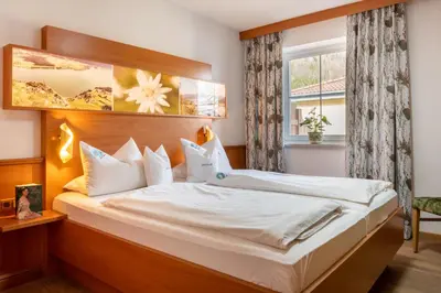 Ein Bett oder Betten in einem Zimmer der Unterkunft Haus Seeromantik