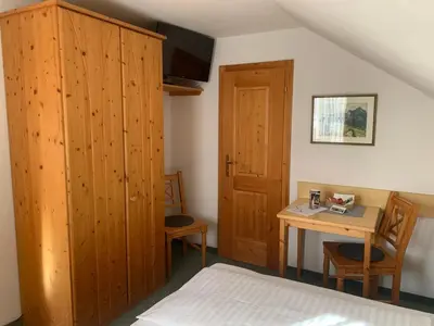 Ein Bett oder Betten in einem Zimmer der Unterkunft Ferienhof Nasnergut