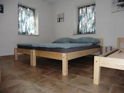 Ein Bett oder Betten in einem Zimmer der Unterkunft Moerth Apartment