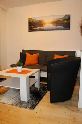 Ein Sitzbereich in der Unterkunft Familienapartment Sunnseitn
