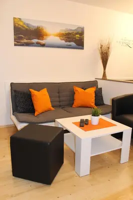 Ein Sitzbereich in der Unterkunft Familienapartment Sunnseitn