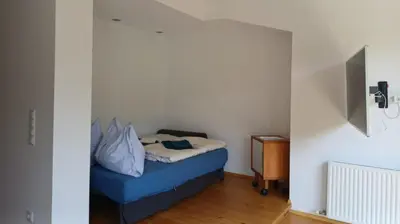 Ein Bett oder Betten in einem Zimmer der Unterkunft Privatzimmervermietung Wiederkehr