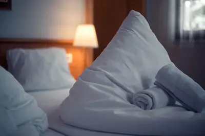 Ein Bett oder Betten in einem Zimmer der Unterkunft Die feine Herberge